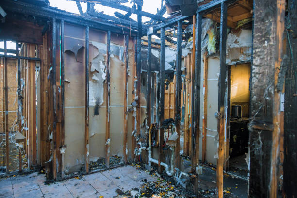 Professional Emergency Fire Cleanup technician working in Justice, OK